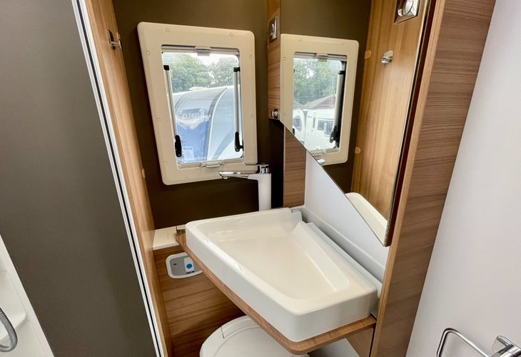 Bathroom Sink And Window Area Adria Coral XL Axess 600 DP 2022 | Used Motorhome